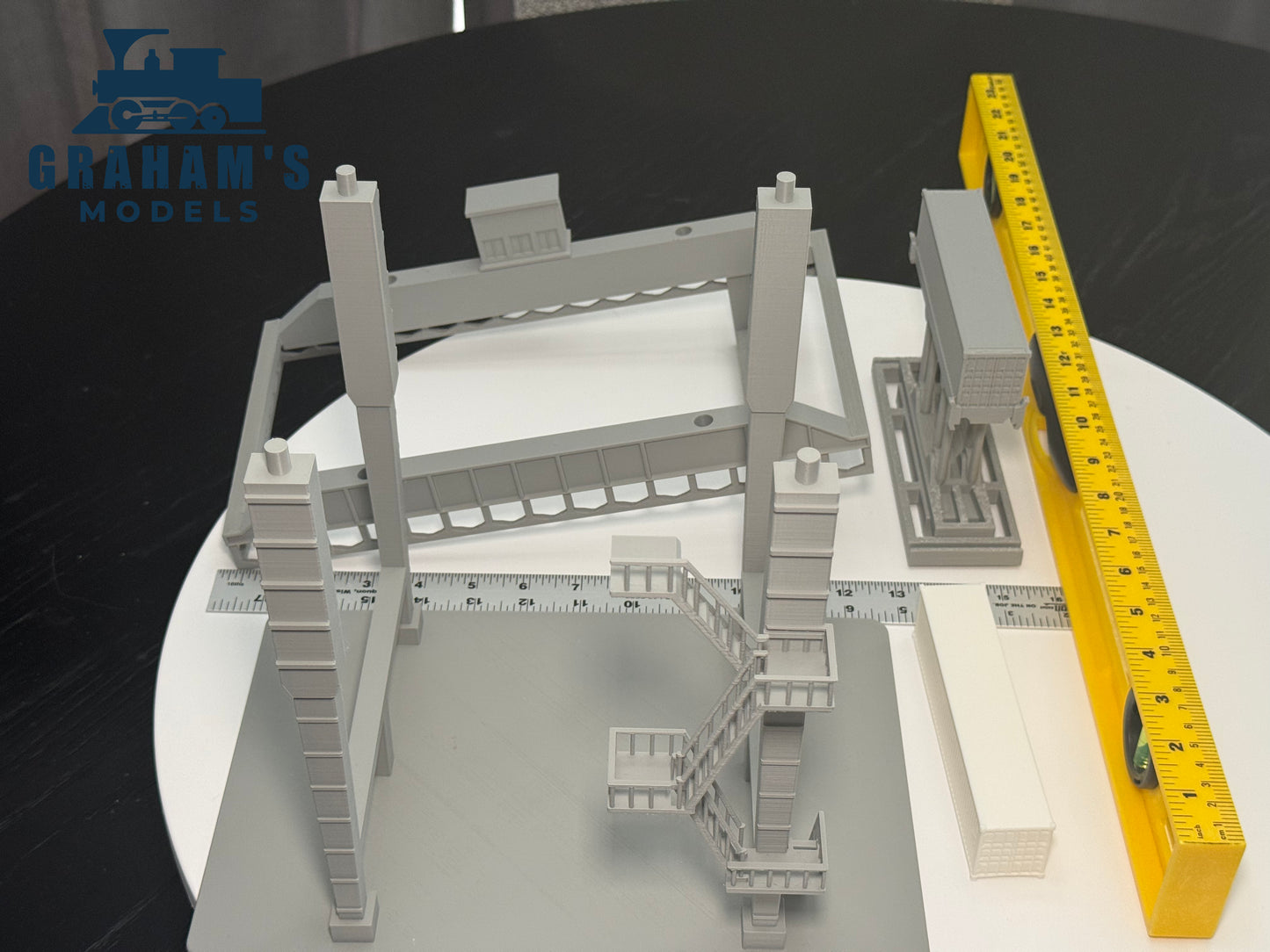 HO scale Graham’s Models container crane, mostly assembled, 1:87 gauge, with detailed structure and realistic design for model railroads.