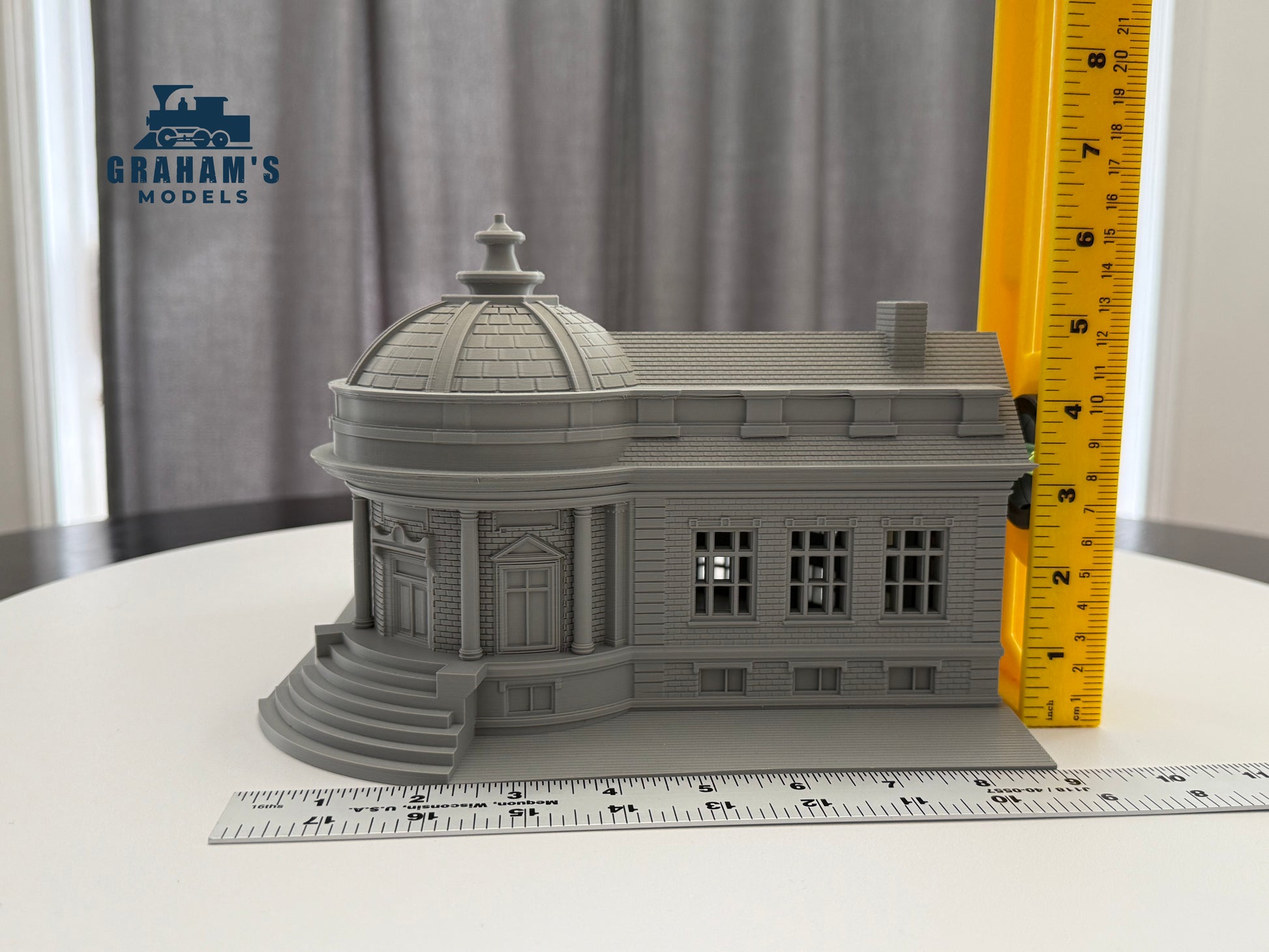 Preassembled HO scale library and city hall building for model train setups, featuring detailed architecture by Graham’s Models.
