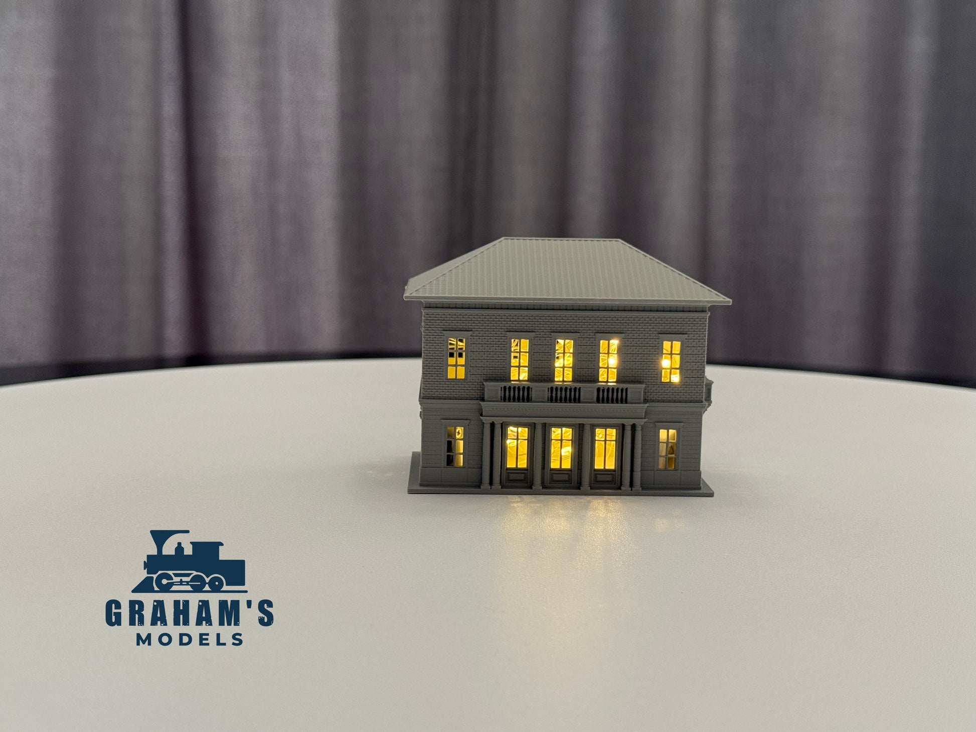 N scale small train station model by Graham’s Models, built and assembled, with detailed platform and station building.