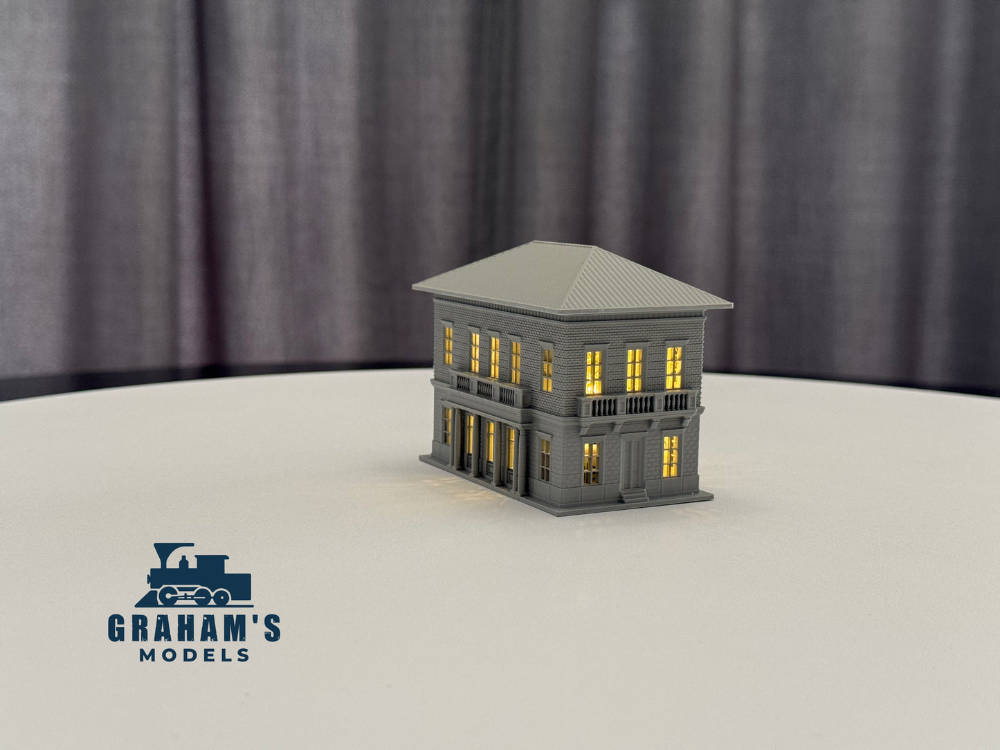 N scale small train station model by Graham’s Models, built and assembled, featuring detailed station architecture for model train layouts.
