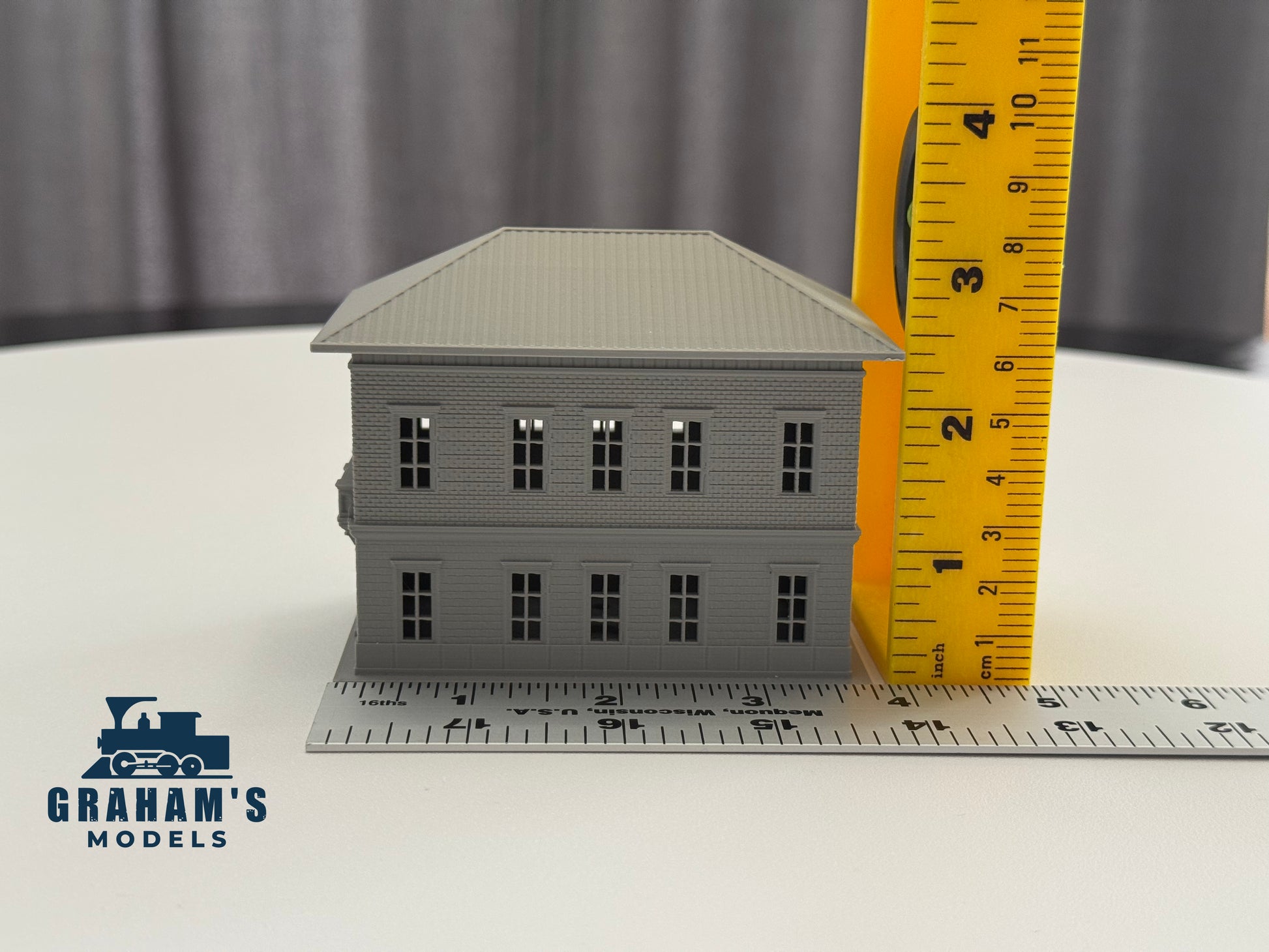 N scale small train station model by Graham’s Models, built and assembled, with detailed station building and platform.