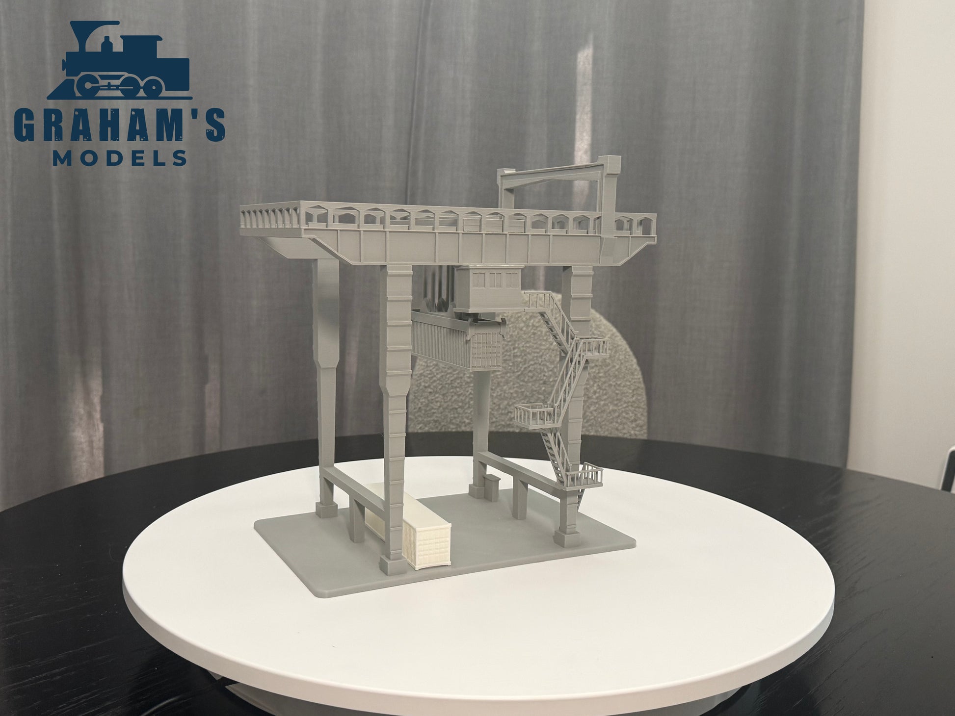 HO scale container crane by Graham’s Models, 1:87 gauge, mostly assembled model for model train setups, detailed industrial crane.