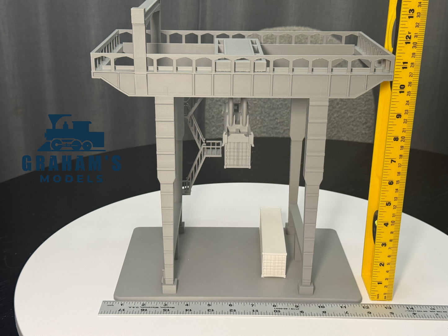 HO scale container crane by Graham’s Models, 1:87 gauge, mostly assembled with detailed structure and colorful containers.