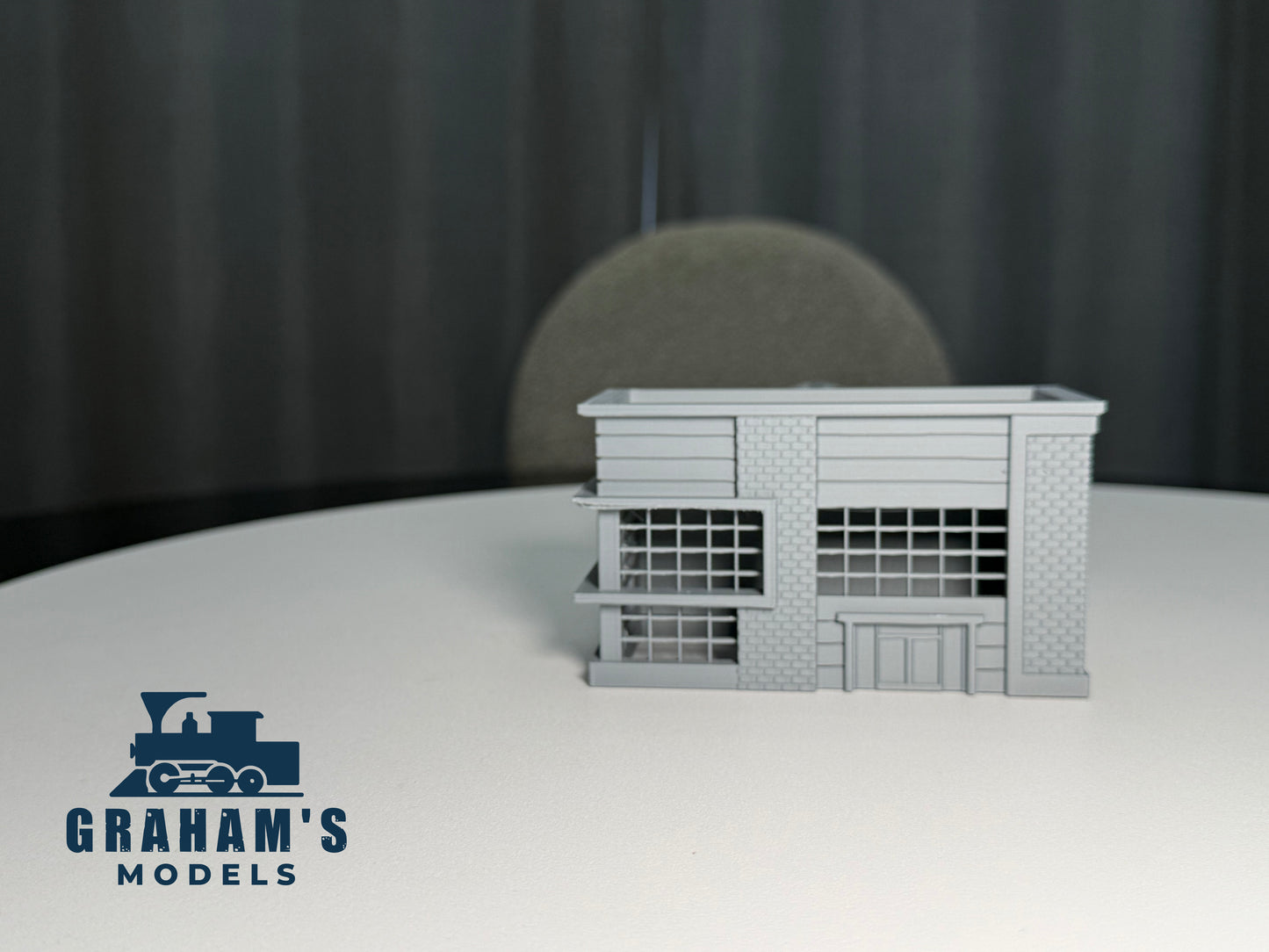 Preassembled N scale shipping logistics warehouse model in 1:160 gauge by Graham’s Models, featuring detailed warehouse building.