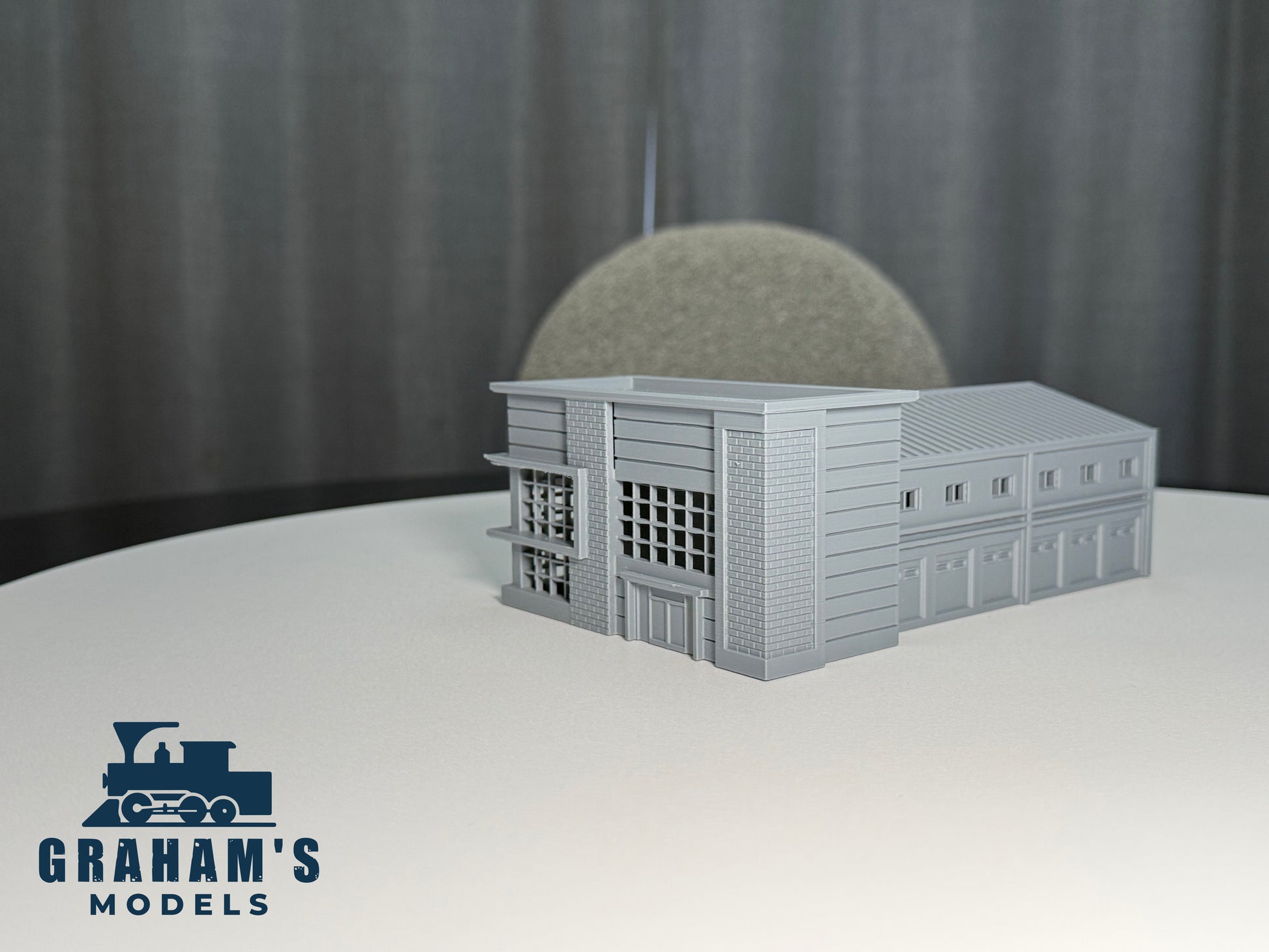 Preassembled N scale shipping logistics warehouse model by Graham’s Models, detailed 1:160 gauge industrial building for model layouts.