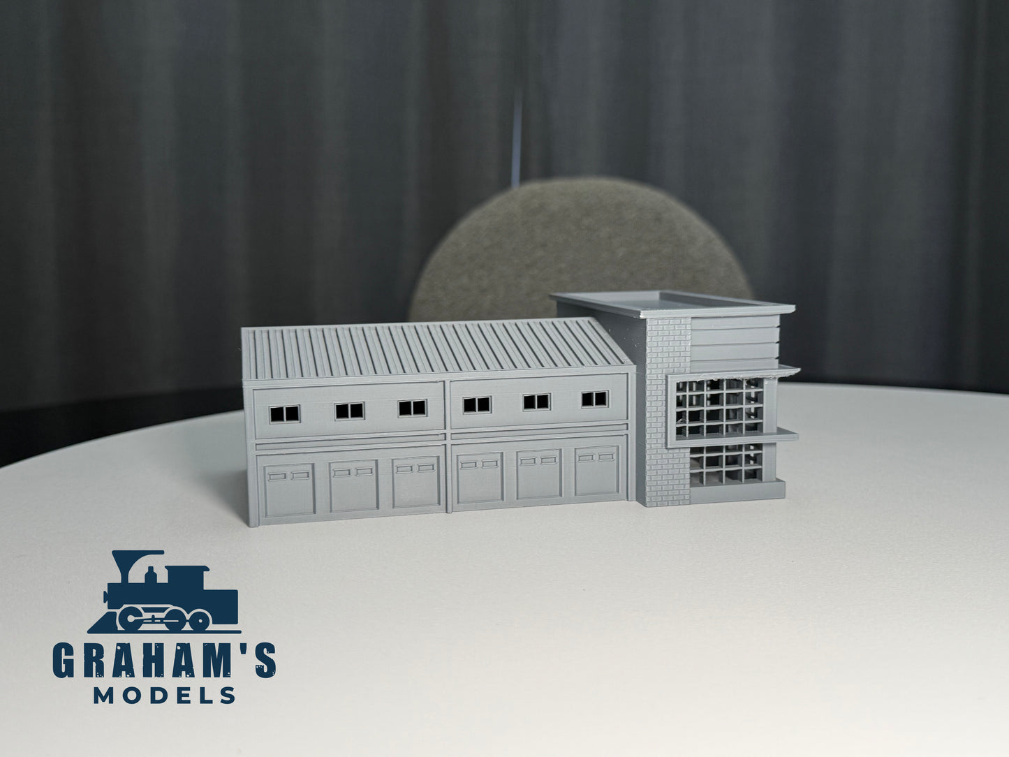Preassembled N Scale shipping logistics warehouse by Graham’s Models, detailed 1:160 gauge model for model train setups.