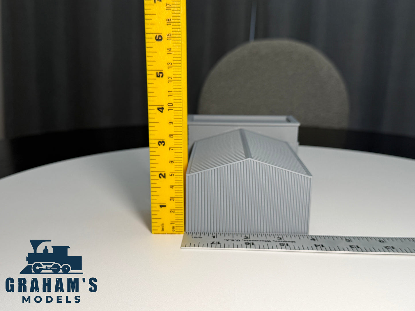 Detailed N scale shipping logistics warehouse by Graham’s Models, preassembled in 1:160 gauge with visible warehouse details.