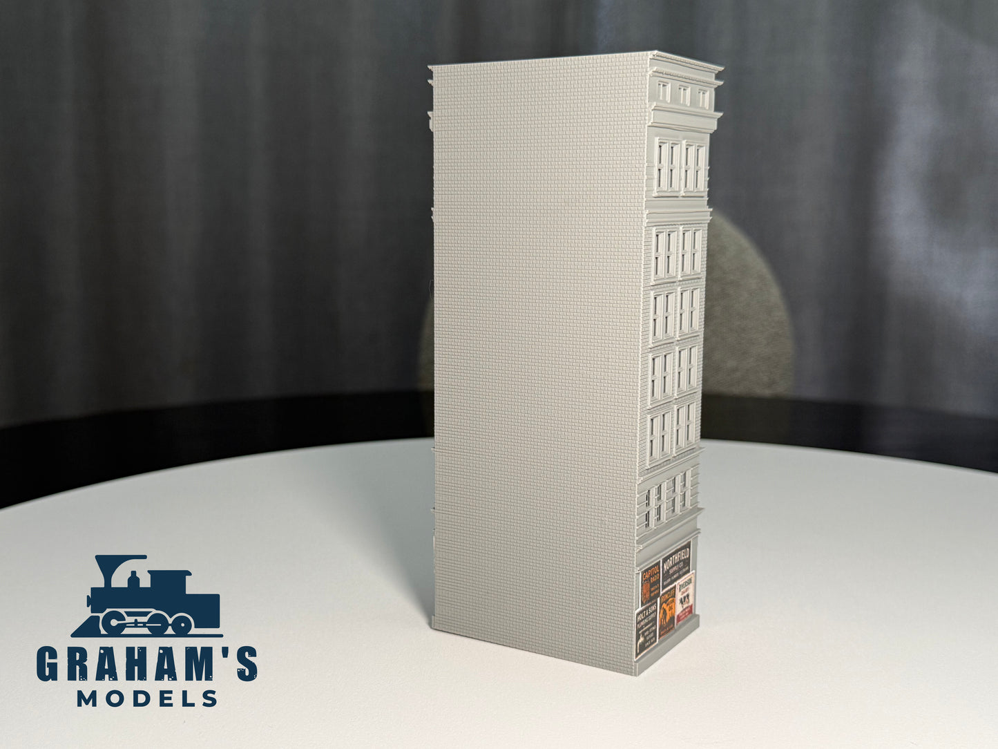 Preassembled N scale small skyscraper model in 1:160 gauge by Graham’s Models, detailed city building for model train layouts.