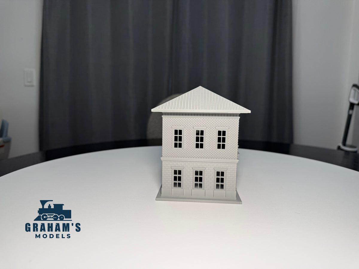 Small HO scale train station by Graham’s Models, fully built and assembled, with detailed platform and station building.