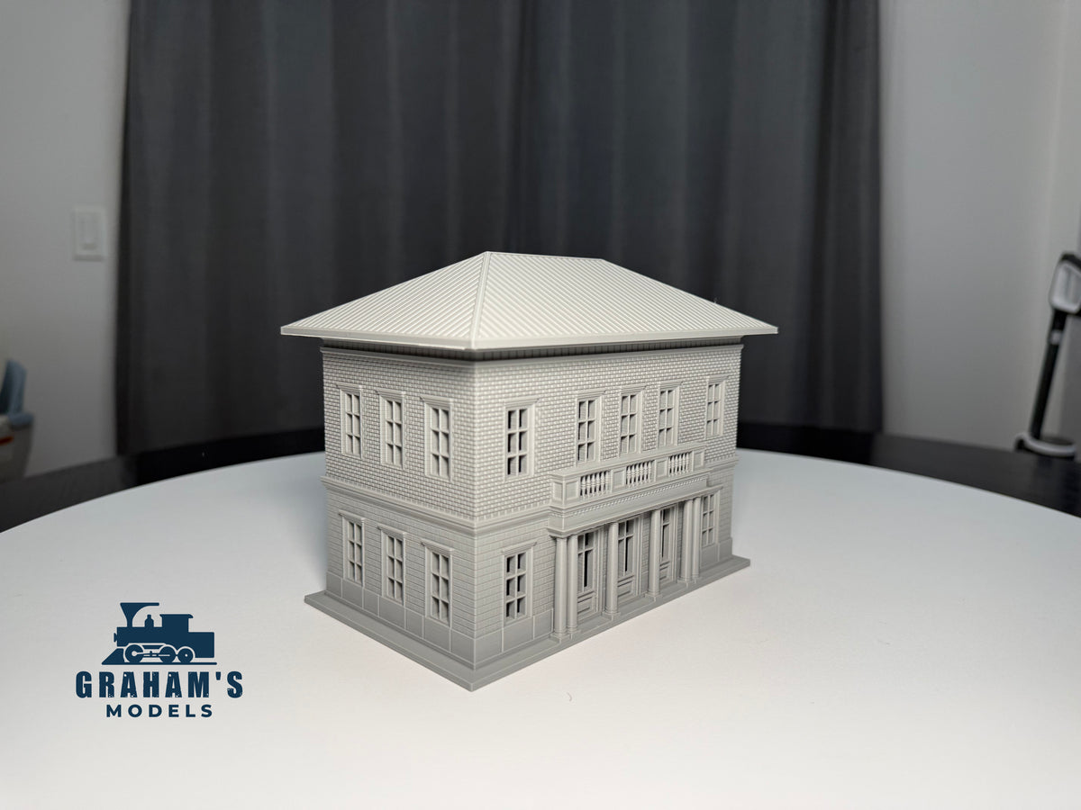 Built HO scale small train station by Graham’s Models, detailed model with platform and station building for model train layouts.
