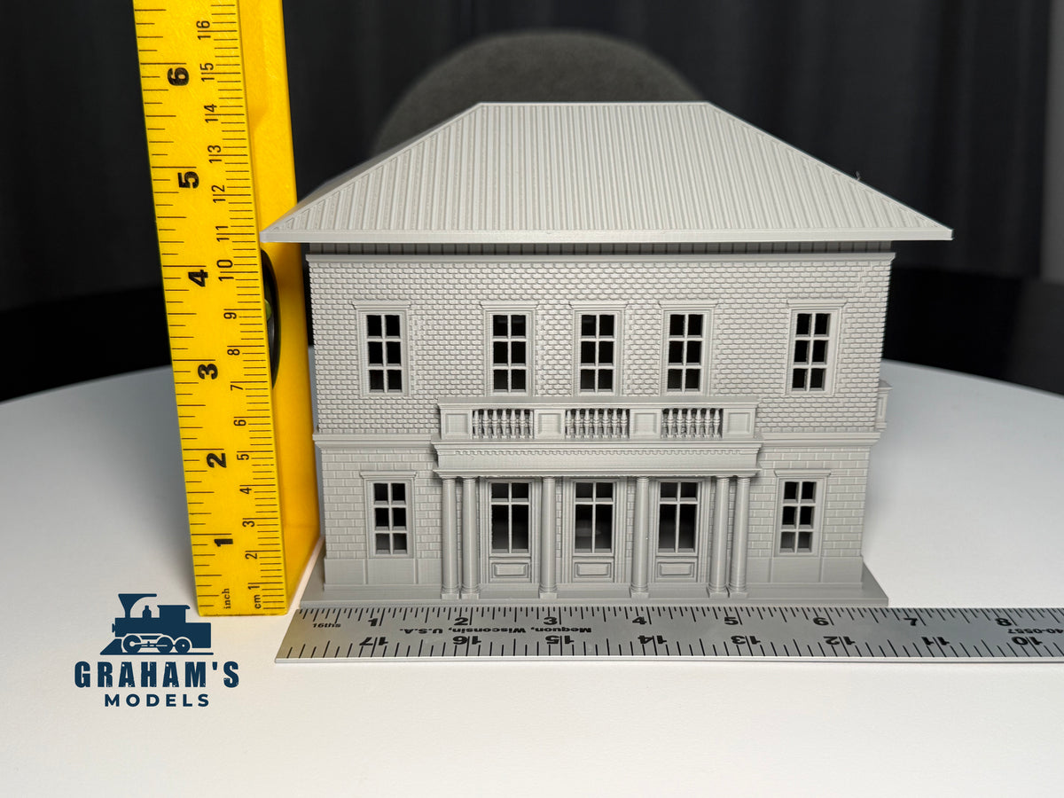 Small HO scale train station by Graham’s Models, built and assembled, with detailed platform and station building for model railroads.