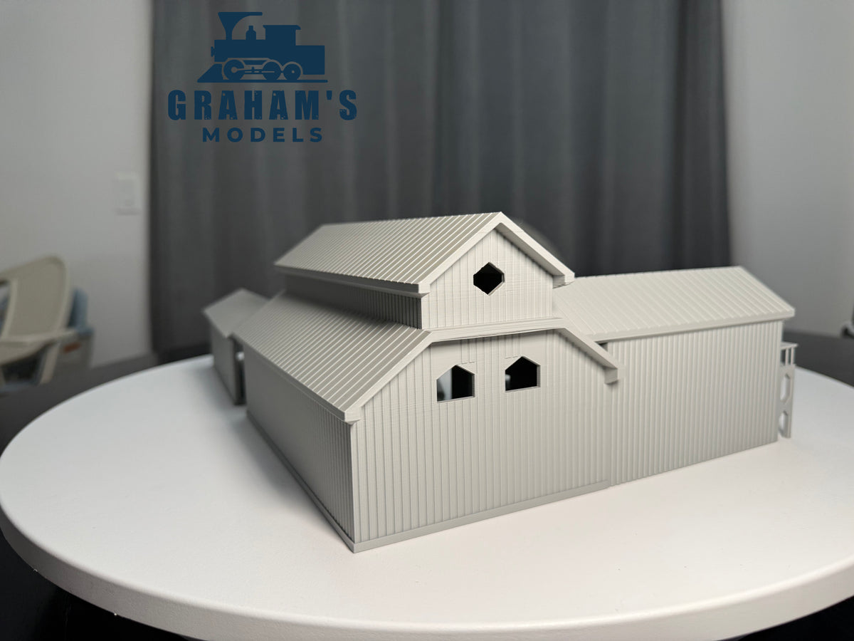 HO scale sawmill lumber yard model by Graham’s Models, preassembled and built, with detailed lumber storage and processing area.