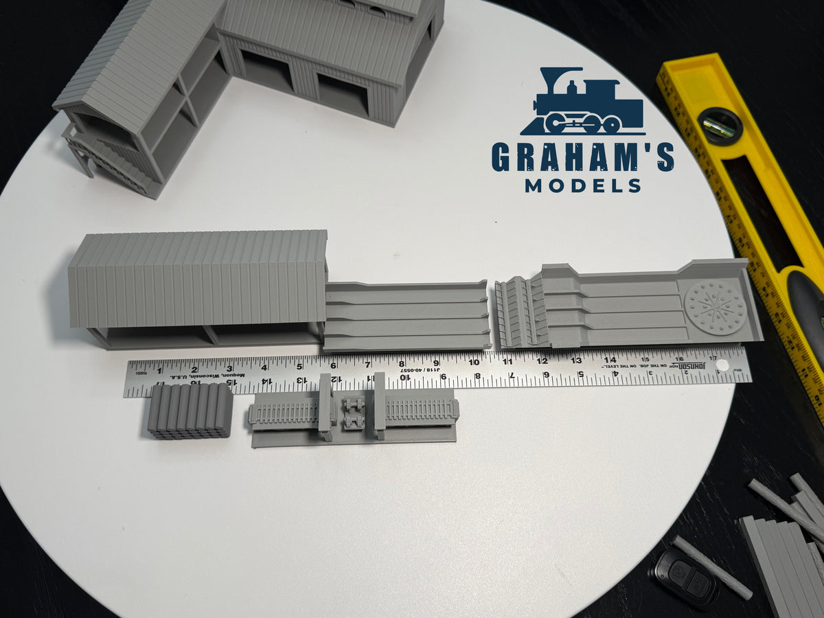 HO scale Graham’s Models sawmill lumber yard in 1:87 gauge, preassembled and built, with detailed wooden structures and logs.